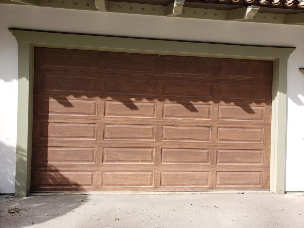 Garage door before faux wood finish